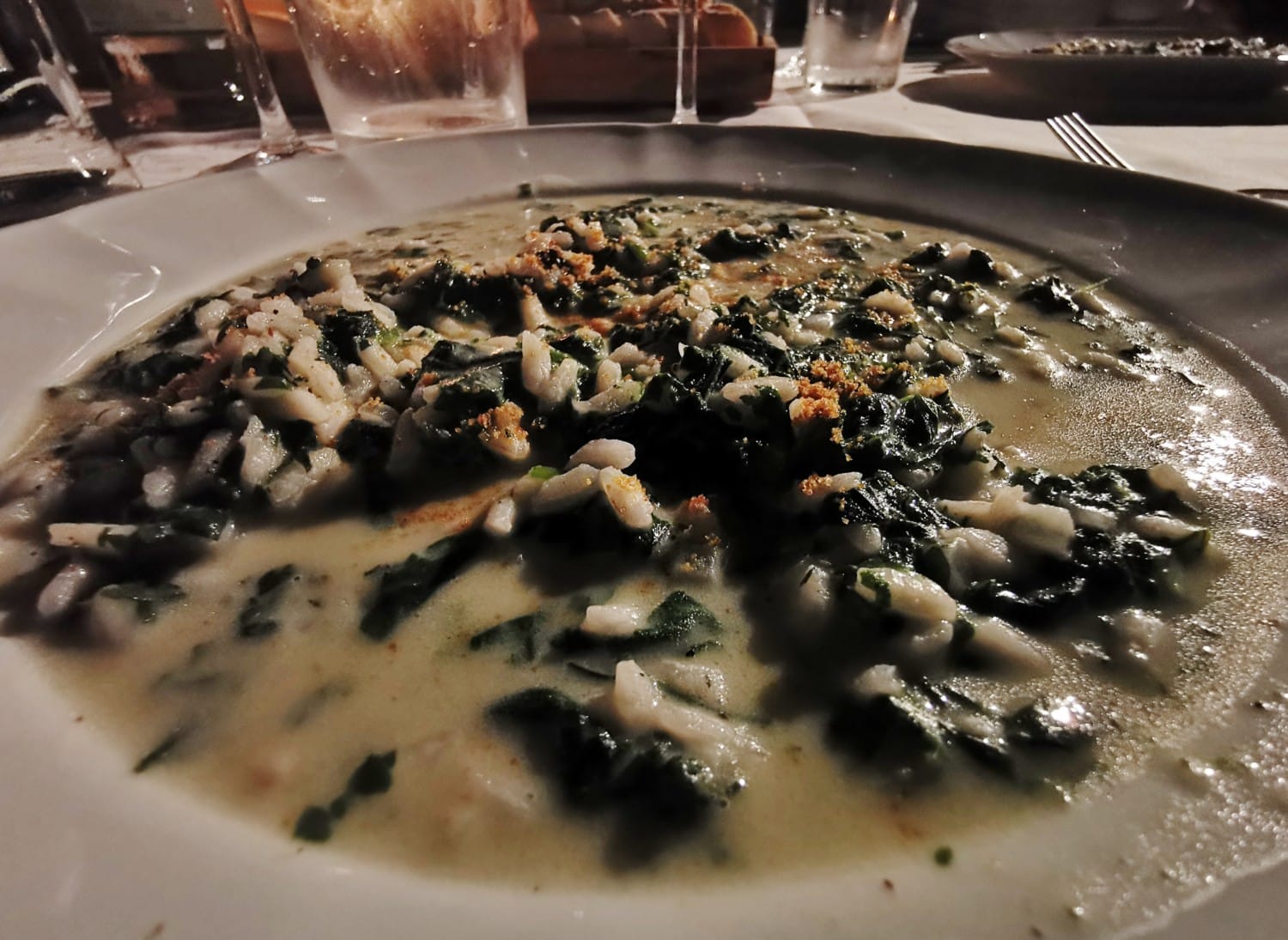 Risotto con spinacino fresco mantecato all’Asino e polvere di bottarga Risotto con spinacino fresco mantecato all’Asino e polvere di bottarga